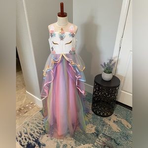 Beautiful unicorn dress. Worn one time as a Halloween costume